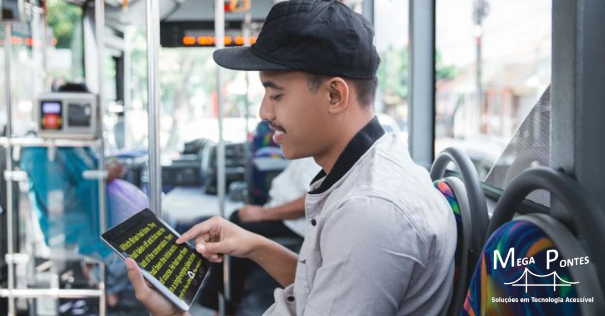 Aluno utiliza o tablet do Prodigi Connect 12 para ler um documento em alto contraste no autocarro